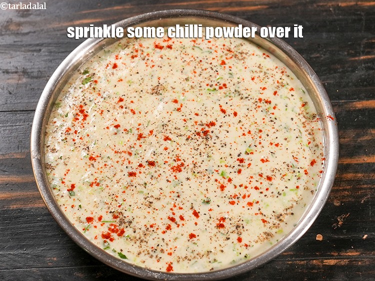 Step 26 – Sprinkle some <a href="https://www.tarladalal.com/glossary-chilli-powder-red-chilli-powder-339i">chilli powder</a>&nbsp;over it.&nbsp;