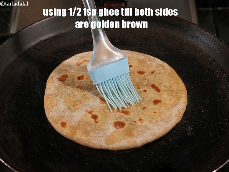 Step 38 – Using 1/2 tsp ghee till both sides are golden brown.