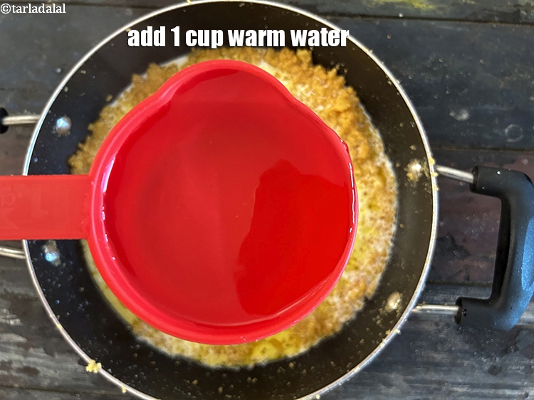 स्टेप 26 – 1 कप गुनगना&nbsp;पानी डालें।