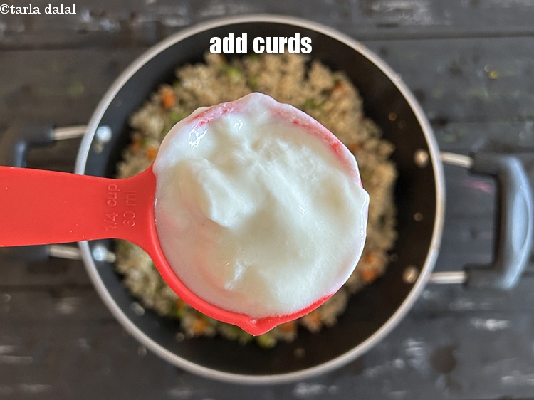 Step 32 – <html><head></head><body><p>Add&nbsp;1/4 cup&nbsp;<a href="low-fat-curds-3962r">low fat curds</a>&nbsp;(dahi) , beaten.</p></body></html>