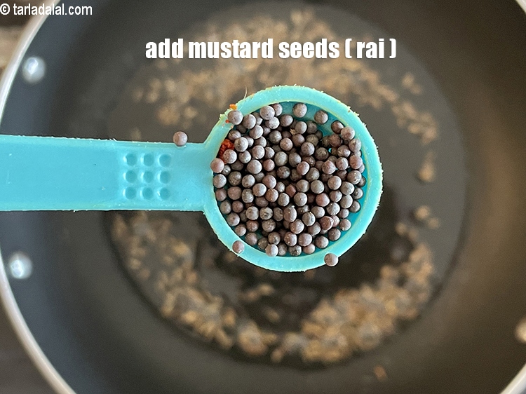 Step 27 – Add&nbsp;<meta charset="UTF-8" />1/2 tsp&nbsp;<a href="glossary-mustard-seeds-sarson-rai-sarson-ke-beej-525i">mustard seeds ( rai / sarson)</a>.