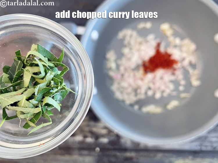 Step 26 – Add&nbsp;<meta charset="UTF-8" /><meta charset="UTF-8" />3&nbsp;<a href="glossary-curry-leaves-kadi-patta-kadipatta-388i">curry leaves (kadi patta)</a>, chopped.