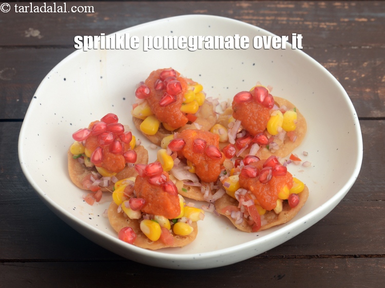 Step 32 – Sprinkle 1/3 cup&nbsp;fresh&nbsp;<a href="https://www.tarladalal.com/glossary-pomegranate-anar-587i">pomegranate (anar)</a>