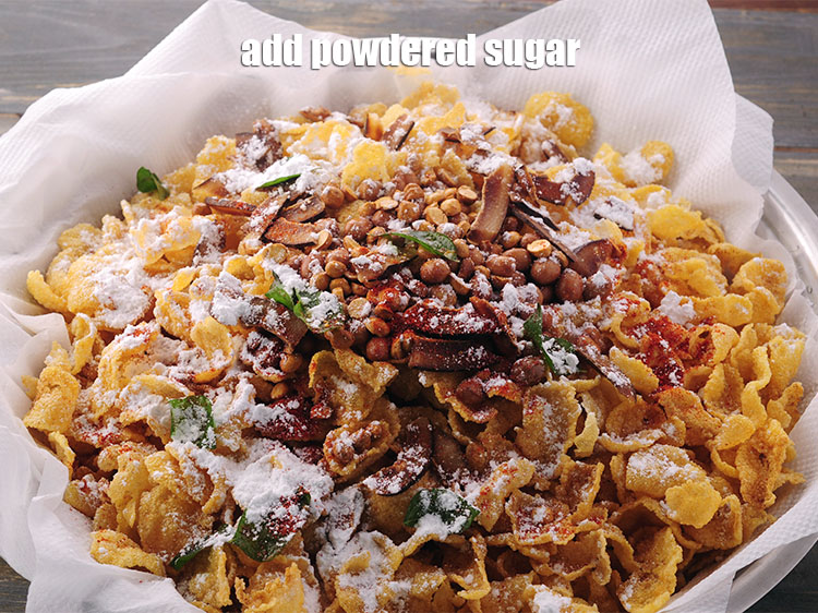 Step 29 – Add the <a href="https://www.tarladalal.com/glossary-powdered-sugar-280i" target="_blank">powdered sugar</a>, see above how to make powdered sugar.