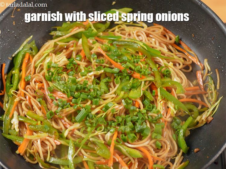 Step 27 – Garnish with spring onions and keep aside.