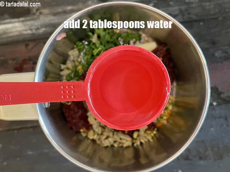 Step 26 – Gradually add 6 tablespoons&nbsp;water to grind into a paste.