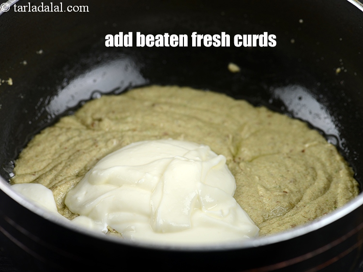 Step 26 – Add 1/3 cup&nbsp;beaten fresh&nbsp;<a href="https://tarladalal.com/glossary-curd-dahi-yogurt-yoghurt-383i">curds (dahi)</a>.&nbsp;