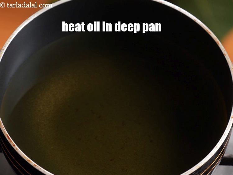 Step 27 – Heat the oil in a deep pan.