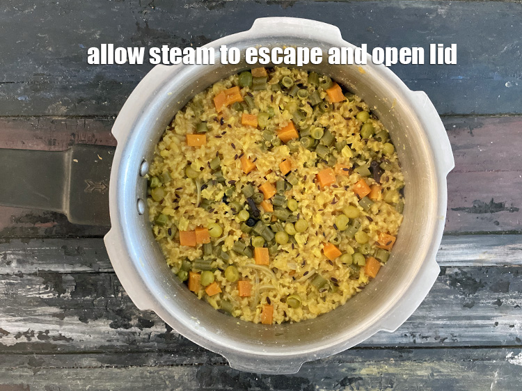 Step 42 – Allow the steam to escape before opening the lid.