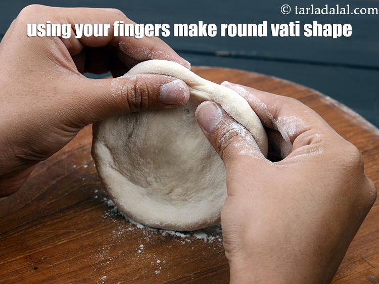 Step 28 – Using your fingers make a round vati shape.&nbsp;
