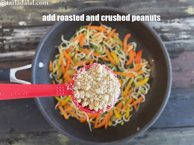 Step 26 – Add&nbsp;<meta charset="UTF-8" />2 tbsp&nbsp;<a href="glossary-roasted-and-crushed-peanuts-1817i">roasted and coarsely crushed peanuts</a>&nbsp;and mix well.