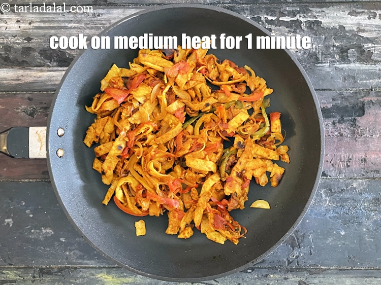 Step 26 – <p>Cook on a medium flame for 1 minute.</p>