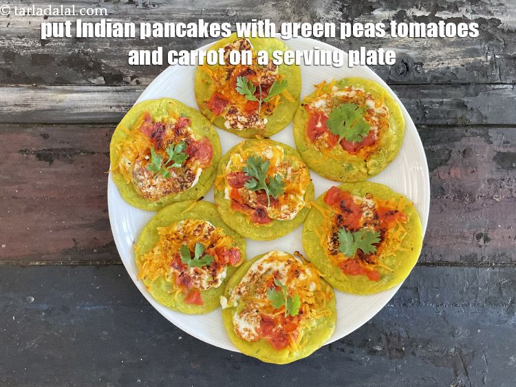 Step 26 – Put <strong>I</strong><strong>ndian pancakes with green peas, tomatoes and carrot </strong>&nbsp;on a serving plate.