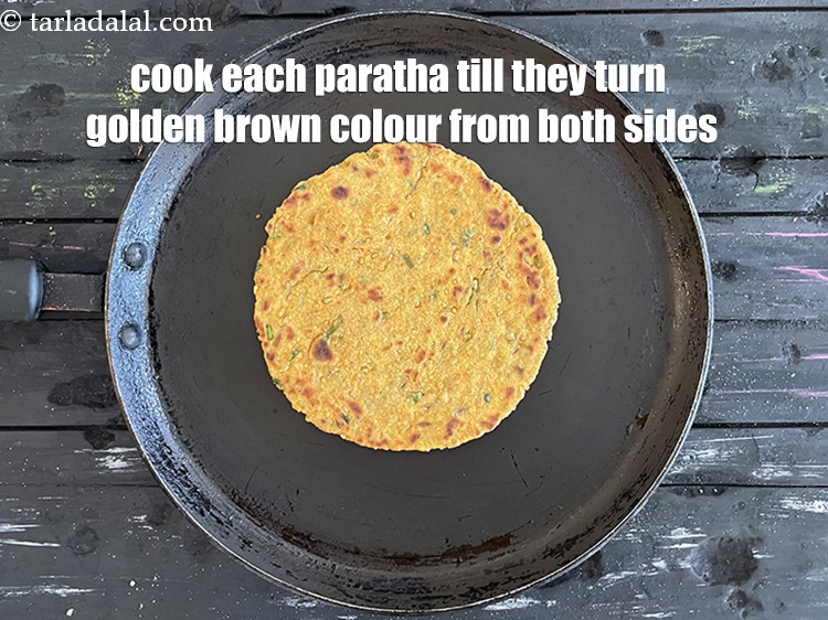 Step 27 – Cook each paratha&nbsp;till they turn golden brown colour from both the sides.