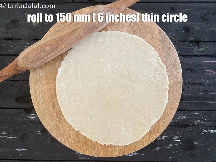 Step 28 – <meta charset="UTF-8" />Roll&nbsp;dough into 150 mm. (6&rdquo;) diameter thin circle using a little whole wheat …