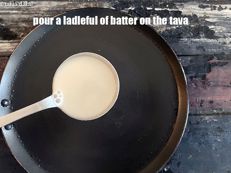 Step 26 – Pour a ladleful of batter or approx. 5 tbsp of the batter on it.