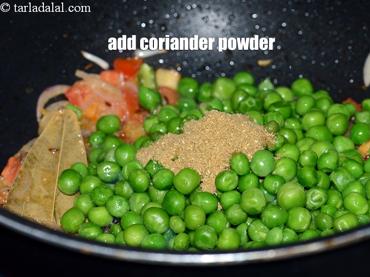 Step 26 – Add &frac12; tsp <a href="https://www.tarladalal.com/glossary-coriander-powder-dhania-powder-370i">coriander (dhania) powder</a>.