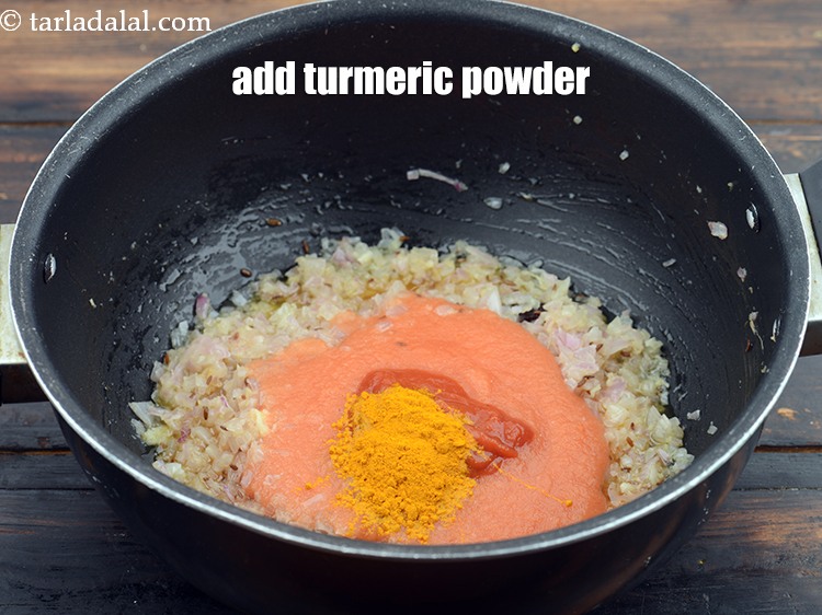 Step 27 – Add 1 tsp&nbsp;<a href="https://www.tarladalal.com/glossary-turmeric-powder-haldi-645i">turmeric powder (haldi)</a>.&nbsp;