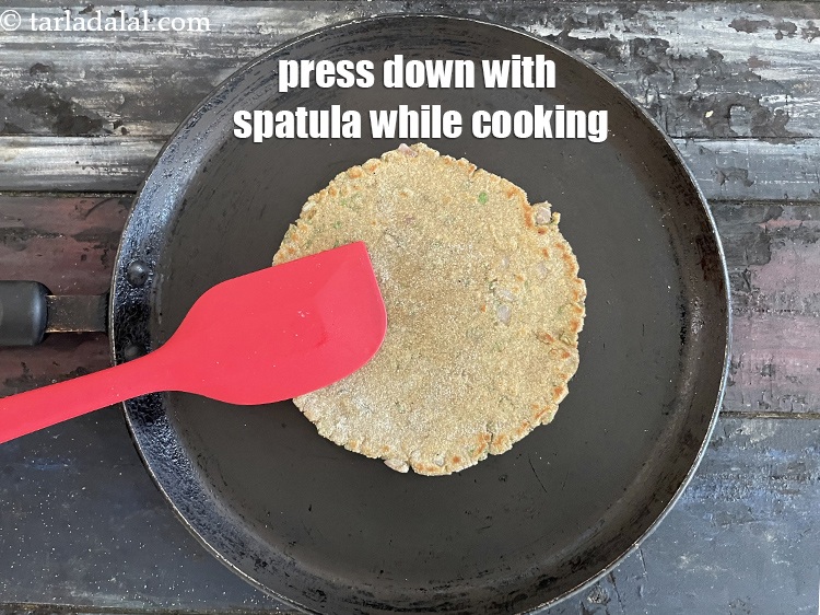 Step 26 – Cook the other side the same way and use a spatula to press down to …