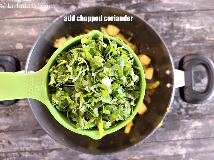 Step 25 – Add&nbsp;<meta charset="UTF-8" />1/2 cup&nbsp;<a href="glossary-chopped-coriander-783i">chopped coriander (dhania)</a>.