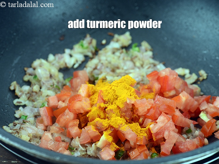 Step 26 – Add 1 tsp <a href="https://www.tarladalal.com/glossary-turmeric-powder-haldi-645i">turmeric powder (haldi)</a>.