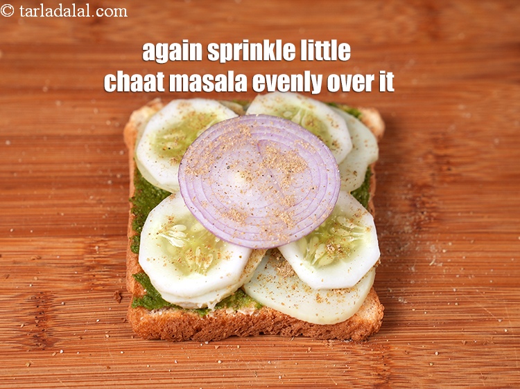 Step 28 – Again sprinkle little <a href="https://www.tarladalal.com/chaat-masala-164r">chaat masala</a> evenly over it.