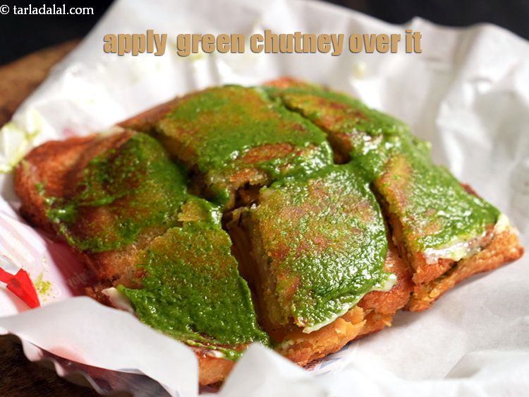 Step 28 – Apply &frac12; tsp of <a href="https://www.tarladalal.com/green-chutney-33414r">green chutney</a> evenly over it.&nbsp;