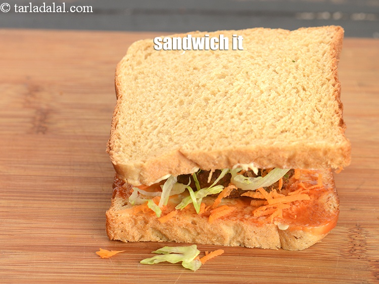 Step 27 – Sandwich it using another bread slice with the buttered-tomato ketchup side facing downwards.