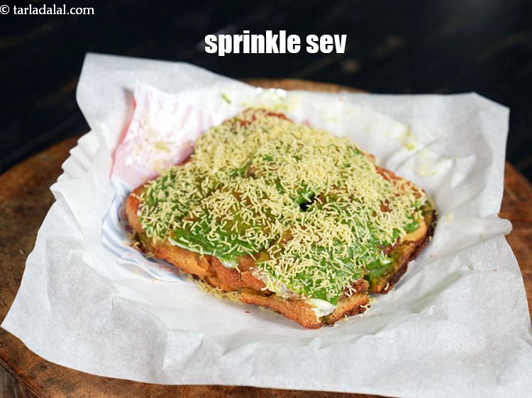 Step 29 – Finally sprinkle 1 tbsp of <a href="https://www.tarladalal.com/glossary-nylon-sev-2630i">nylon sev</a>&nbsp;over it.&nbsp;