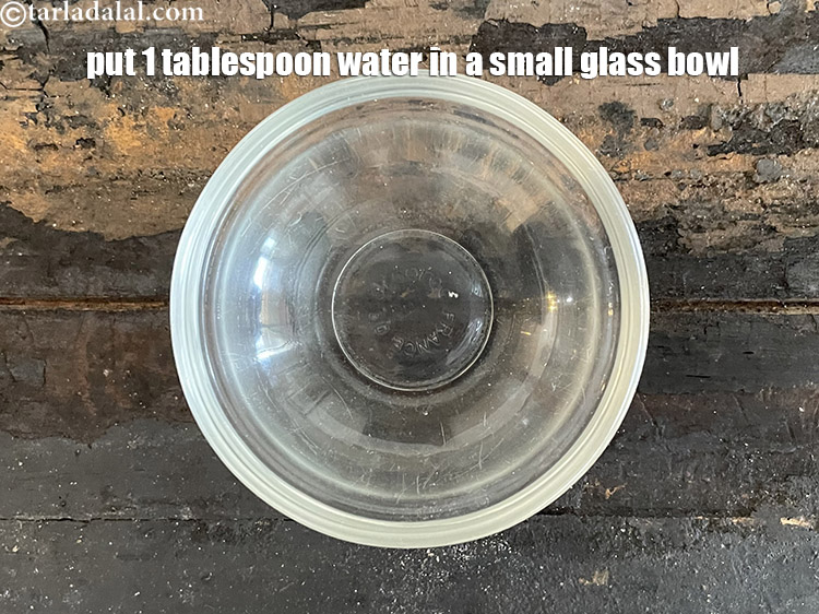 Step 32 – In a small bowl put 1 tablespoon water.