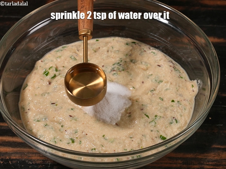 Step 27 – Sprinkle 2 tsp of water over it.