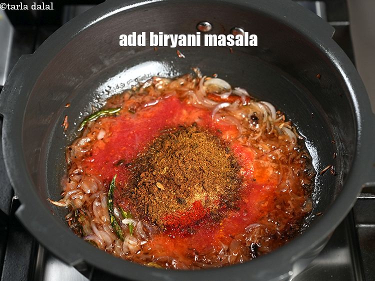 Step 27 – Add 1&frac12; tbsp biryani masala.