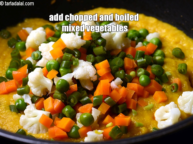 स्टेप 28 – १ १/४ कप&nbsp;<a href=""https://www.tarladalal.com/glossary-chopped-and-boiled-mixed-vegetables-hindi-1884i"">कटी और उबली हुई मिली-जुली सब्जियां</a>&nbsp;(गाजर , …