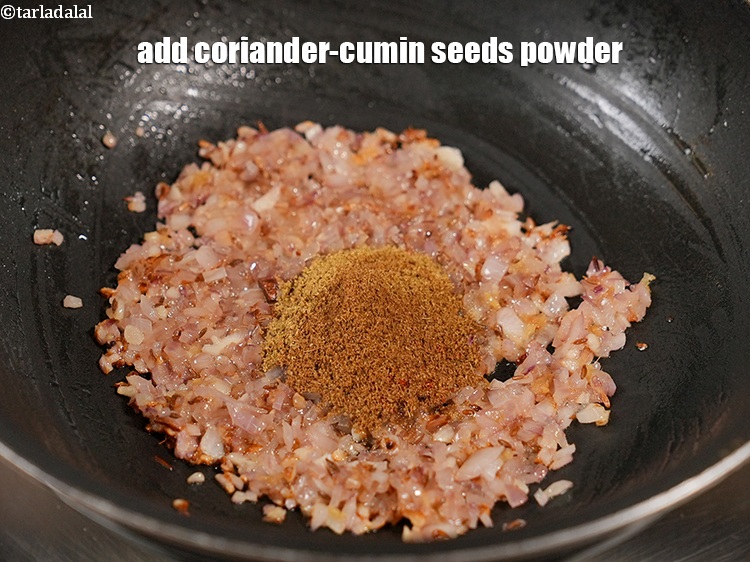 Step 27 – Add 1 tsp <a href="https://www.tarladalal.com/glossary-coriander-cumin-seeds-powder-dhania-jeera-powder-375i">coriander-cumin seeds (dhania-jeera) powder</a>.