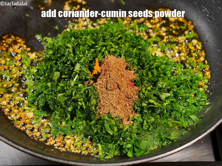 Step 27 – Add 1 tsp&nbsp;<a href="https://www.tarladalal.com/glossary-coriander-cumin-seeds-powder-dhania-jeera-powder-375i">coriander-cumin seeds (dhania-jeera) powder</a>.