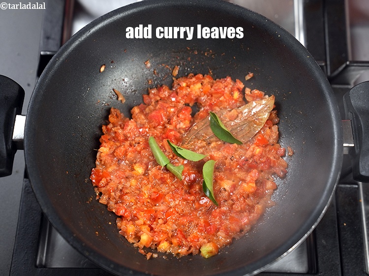 Step 27 – Add 5 to 6 curry leaves.