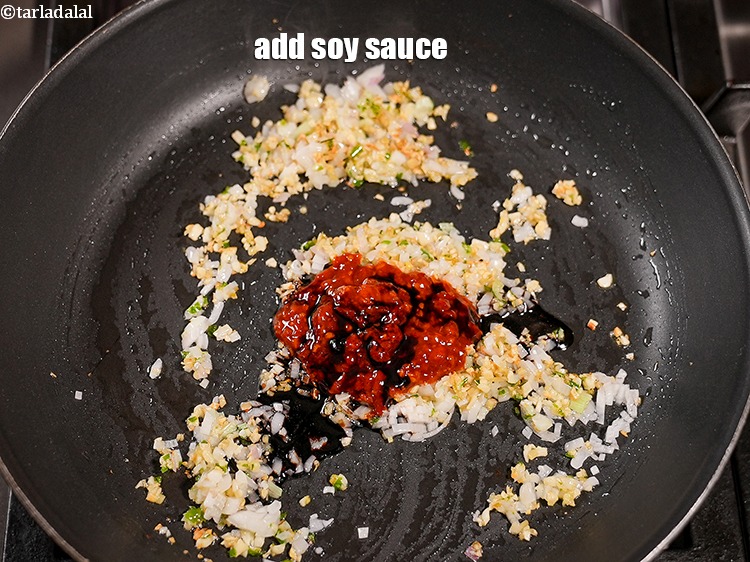 Step 26 – Add 1 tsp <a href="https://www.tarladalal.com/glossary-soy-sauce-soya-sauce-864i">soy sauce</a>.