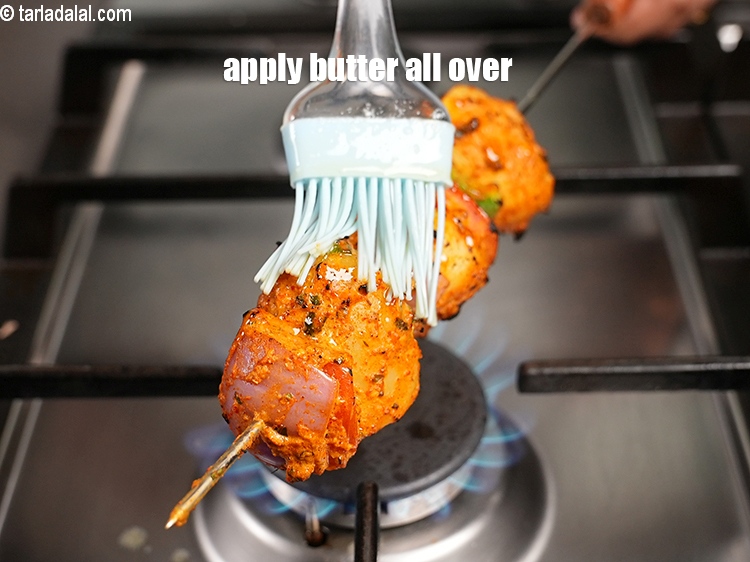 Step 28 – Apply melted butter all over the skewer.