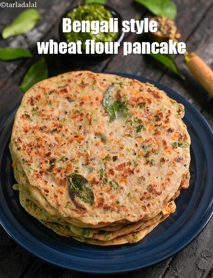 Step 28 – Serve the <strong>gula ruti</strong> hot with green chutney.