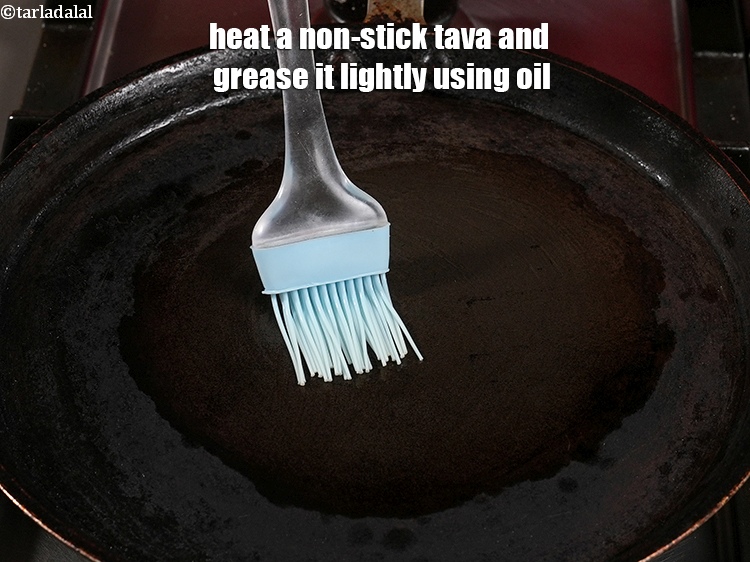 Step 47 – Fold both&nbsp;ends of the paratha inwards and brush with little water to seal the&nbsp;lifafa paratha …