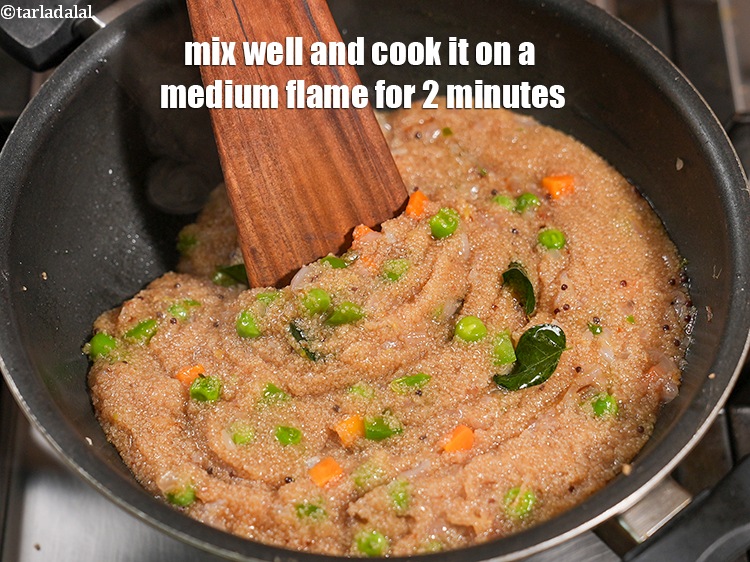 Step 27 – Mix well and cook it on a medium flame for 2 minutes.