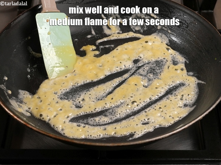 Step 28 – Mix well and cook on a medium flame for a few seconds.&nbsp;