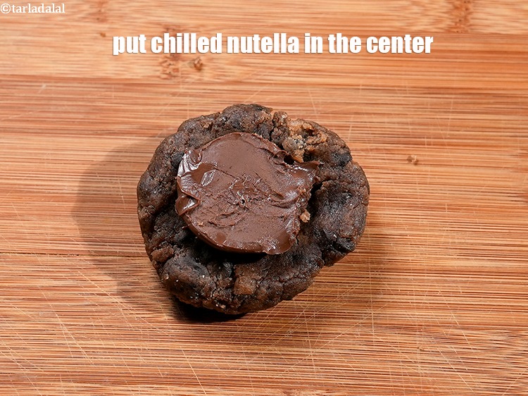 Step 27 – Put &frac12; tbsp of the chilled nutella in the center.