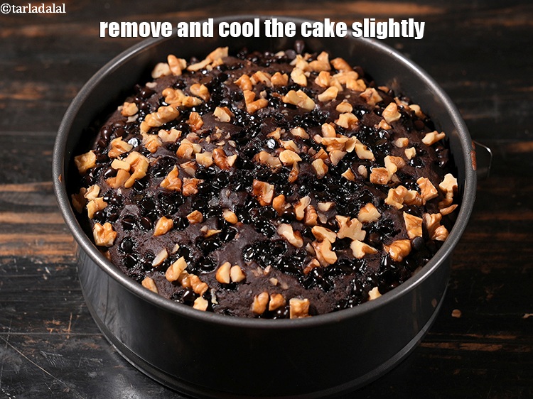 Step 27 – Remove and cool the cake slightly.