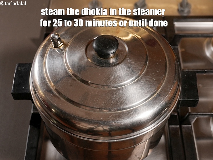 Step 27 – Steam the dhokla in the steamer for 25 to 30 minutes or until done.