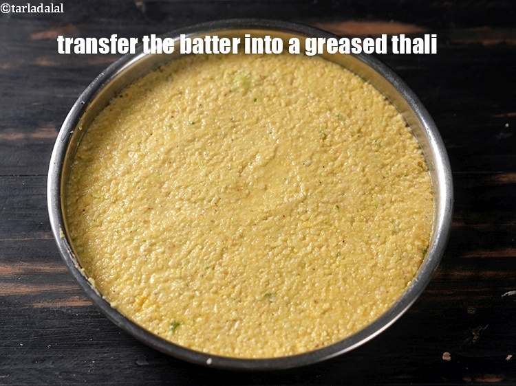 Step 27 – Transfer the batter into a greased thali.
