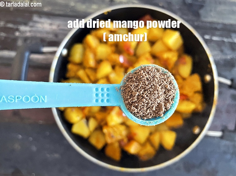 Step 27 – Add&nbsp;<meta charset="UTF-8" />1/2 tsp&nbsp;<a href="glossary-dried-mango-powder-amchur-powder-148i">dried mango powder (amchur)</a>.