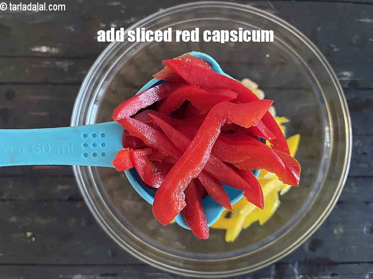Step 27 – Add&nbsp;<meta charset="UTF-8" /><strong>1/2&nbsp;</strong>cup&nbsp;<a href="glossary-sliced-red-capsicum-2176i">sliced red capsicum</a>.
