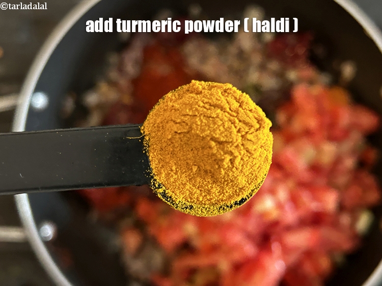 Step 27 – <html><head></head><body><p>Add&nbsp;1/2 tsp&nbsp;<a href="glossary-turmeric-powder-haldi-645i">turmeric powder (haldi)</a>.</p></body></html>