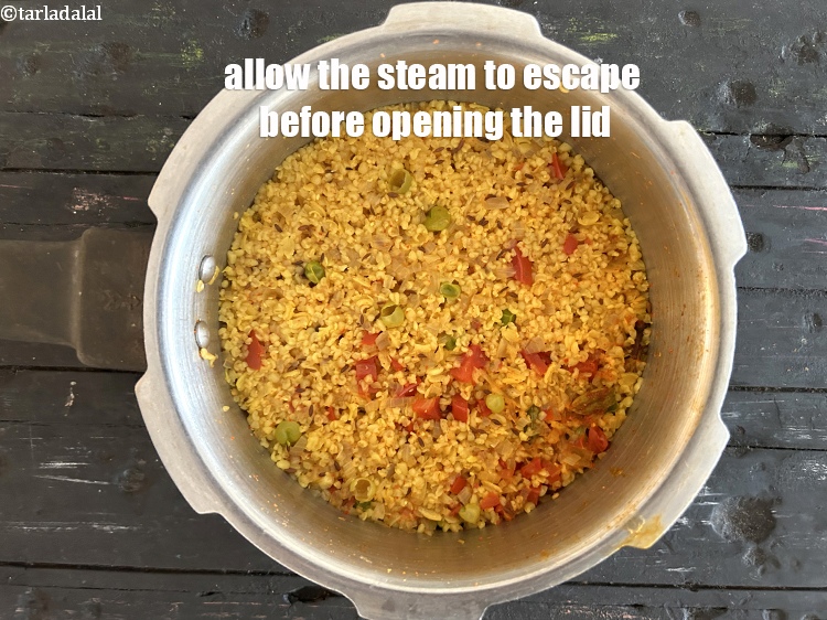 Step 30 – <p>Allow the steam to escape before opening the lid.</p>
